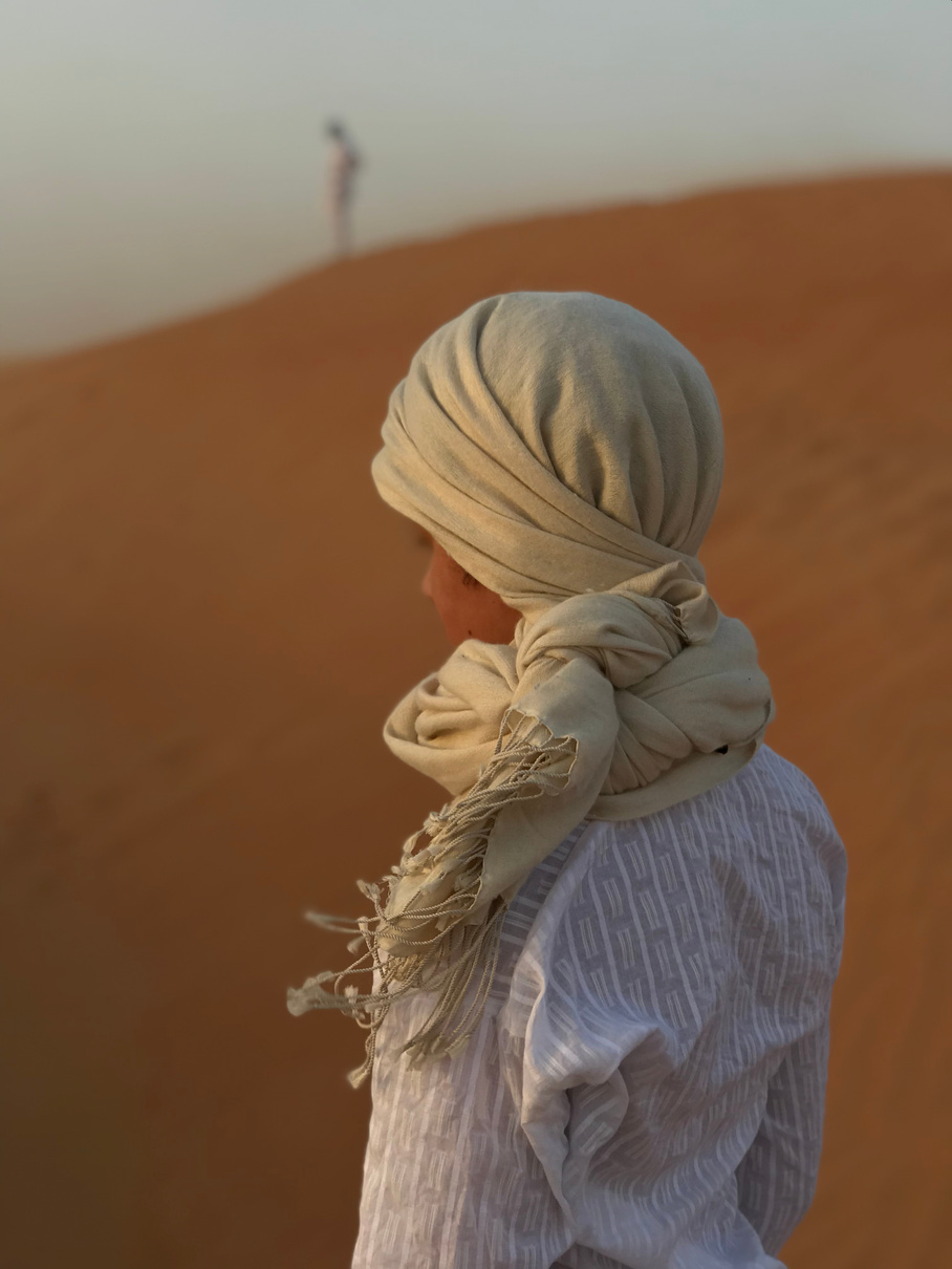 Woman wearing brown scarf